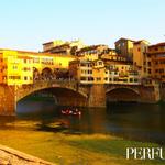 Another day in Florence comes to a close as the late afternoon sun hits the Medieval Ponte Vecchio.